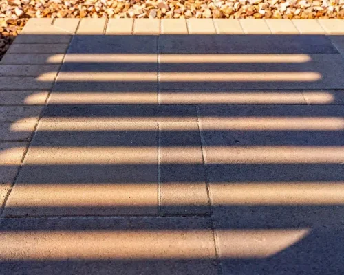 closeup of paver patio installation by new age design and build in san diego